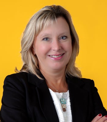 Portrait of Colleen Brinkoetter, Broker/Realtor, ABR, CRS.
